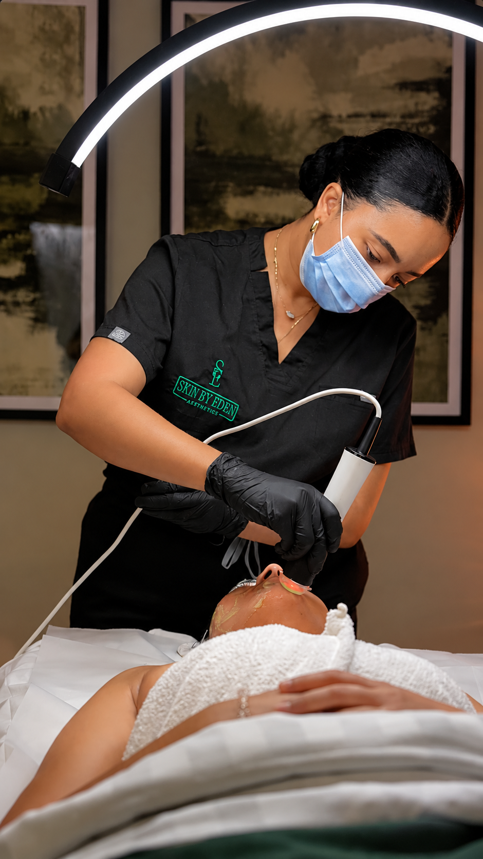 Illustrative image: A facial treatment in a calm neutral setting